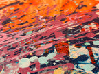 Close-up of I Have My Own Gravity showing layered pink and mauve drip lines, red speckles and pale aqua dots under orange.