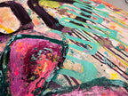 Close-up of In Bloom showing a heavy pink petal, dark green outlines, turquoise squiggles and black drip lines on a warm yellow ground.