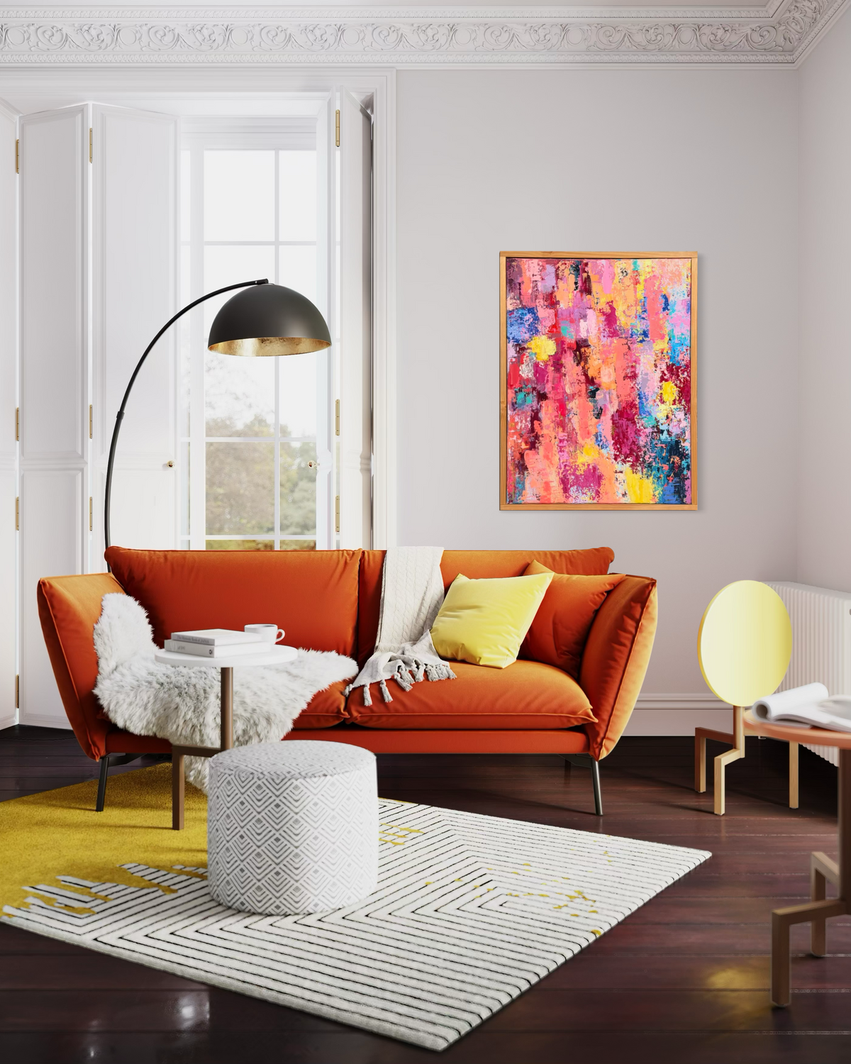Thought Trains, Like High Voltage Electricity Running Through My Veins, in mixed media on stretched canvas: textured coral, magenta, yellow and blue, framed above an orange sofa.