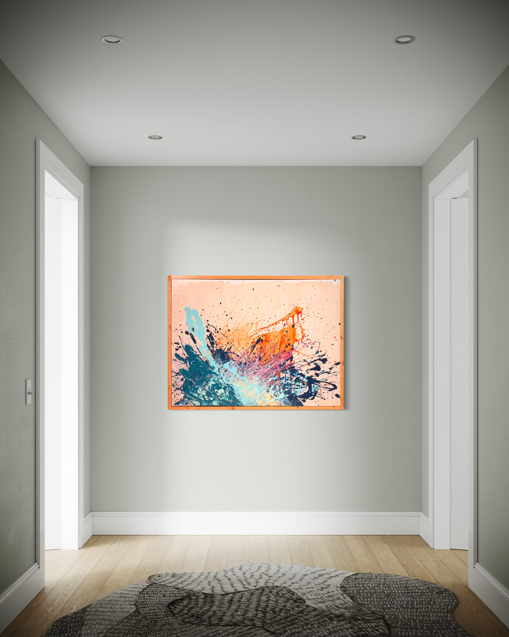I Have My Own Gravity hanging at the end of a quiet gray hallway, its burst of orange and blue splatter framed in warm wood.