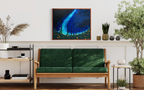 The View From The Grass, a night scene in mixed media on stretched canvas: a turquoise Milky Way over dark grass and golden fireflies, in a copper frame above a green sofa.