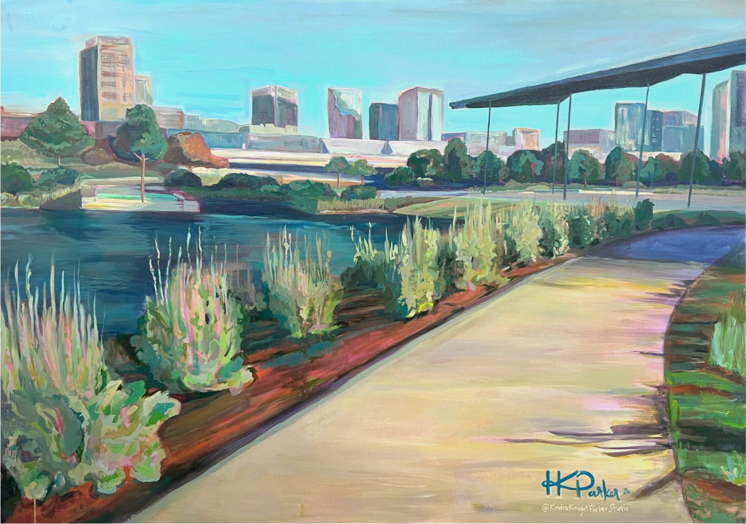 Railroad Park by Kindra Knight Parker: a modern impressionistic landscape of a park path curving past a pond and pastel grasses toward the Birmingham skyline under a turquoise sky.